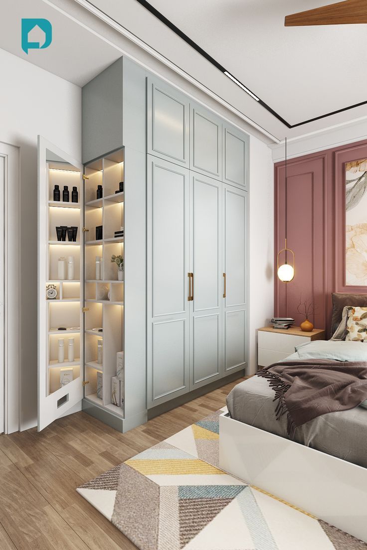 a bedroom with white and pink walls, wooden floors and built in closets on the wall