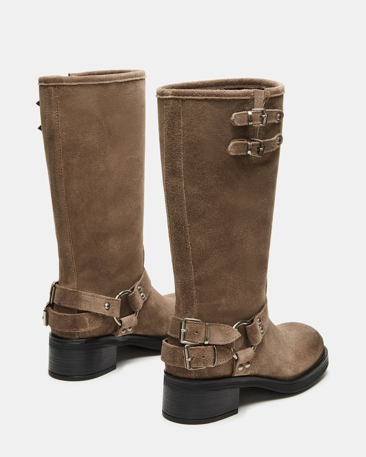 The ASTOR square toe boot features a slouchy mid-calf silhouette reinforced with strap accents and substantial buckle hardware. A wide sole with a block heel provides a solid foundation for this engineer-inspired design. Square toe block heel engineer boot Slip-on style Heel harness strap with hardware Top gore with 2 buckle straps for adjustable fit 2 inch heel height Size 6 measurements: 13.75 inch shaft circumference, 11.5 inch shaft height Size 8 measurements: 14 inch shaft circumference, 12 Knee-high Moto Boots With Buckle Closure For Work, Rugged Wide Calf Moto Boots For Fall, Fall Mid-calf Boots With Buckle Closure, Fall Moto Boots With Buckle Closure And Square Toe, Fall Suede Moto Boots With Buckle Closure, Engineer Boots, Suede Boots Knee High, Design Square, 2 Inch Heels