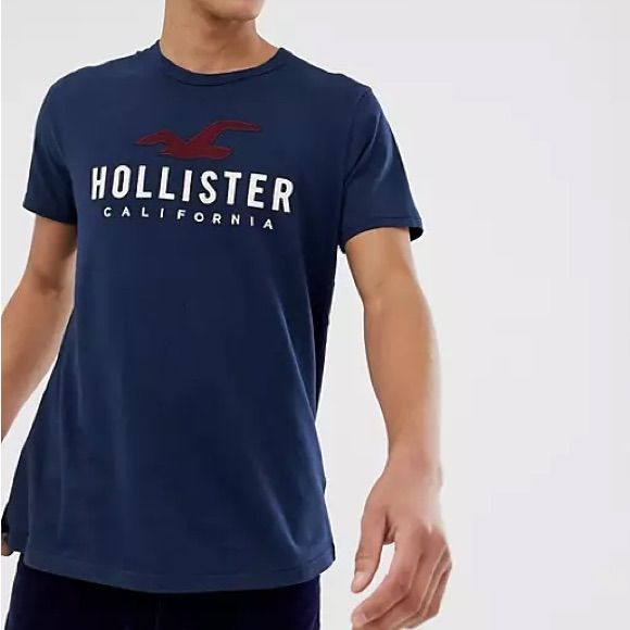 Nwt/ 100% Color: Navy Blue / Size: Small Hollister Co. / Men's Logo Graphic Tee Spring Navy Crew Neck Shirt, Navy Crew Neck Shirt For Spring, Navy Tops For Spring Streetwear, Navy Cotton Top With Letter Print, Navy Cotton Tops With Letter Print, Branded Blue Summer Tops, Navy Graphic Print Cotton Tops, Navy Cotton Graphic Print Shirt, Navy Cotton Shirt With Graphic Print