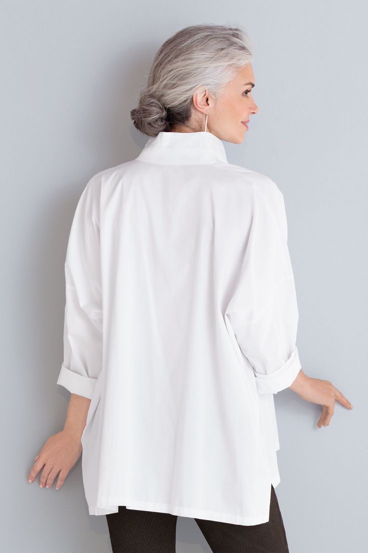 back view, white Oversized Classic Shirt With Fold-down Collar, Classic Oversized Shirt With Fold-down Collar, Oversized Classic Shirt With Fold Down Collar, Classic Oversized Shirt With Fold Down Collar, Solid Color Stand Collar Tops For Work, White Tops With Roll-up Sleeves For Everyday, Everyday Tops With Roll-up Sleeves, Oversized Classic Tops For Business Casual, Spring Shirt With Stand Collar And Pockets