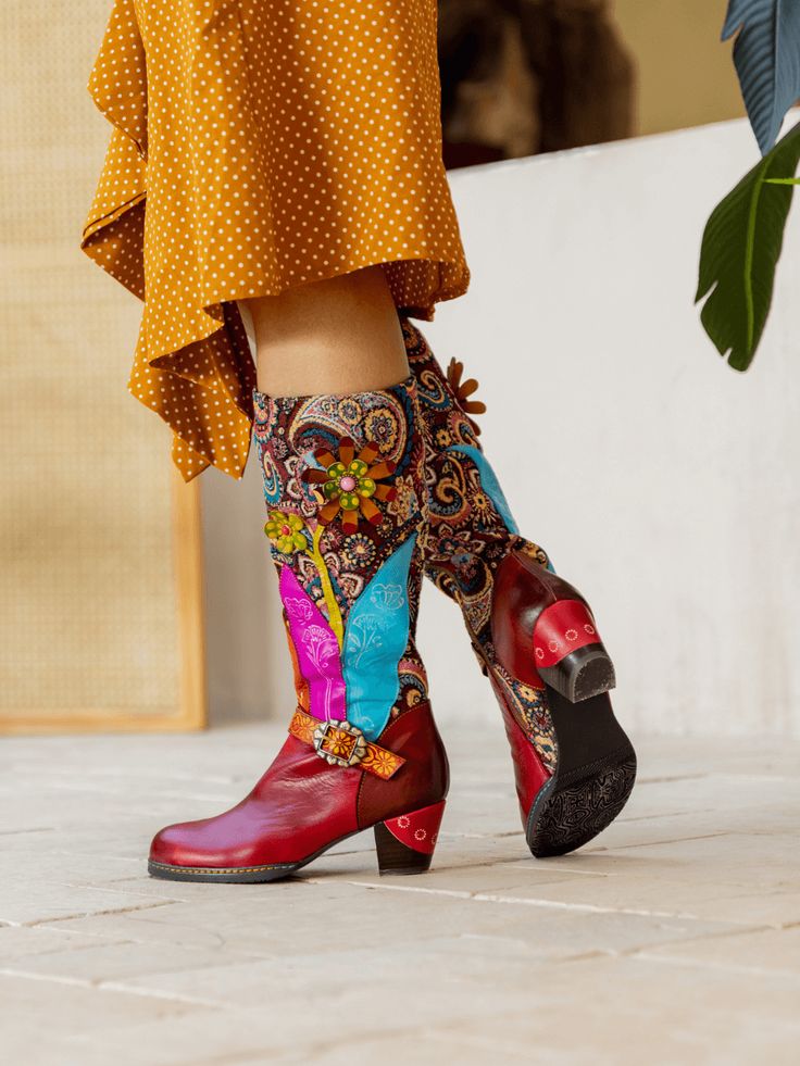 Tread the streets in style with Soffia's Brycen Abstract Swirl Print Floral Applique Leather Boots! Crafted from durable leather with an irresistible abstract swirl print design, these boots offer personalized style that is sure to turn heads. Step up your shoe game and strut with joy in these on-trend boots! 1.77'' heel 14.4" Shaft 16.8" Circumference Zip closure Leather upper Leather & Cotton lining Leather footbed Leather midsole Leather insole Rubber sole Bohemian Red Leather Boots, Fall Bohemian Leather Heeled Boots, Bohemian Leather Heeled Boots For Fall, Bohemian High Heel Leather Boots, Bohemian Leather Boots For Winter, Trend Boots, Reindeer Headband, Daily Dress, Dress Jewelry