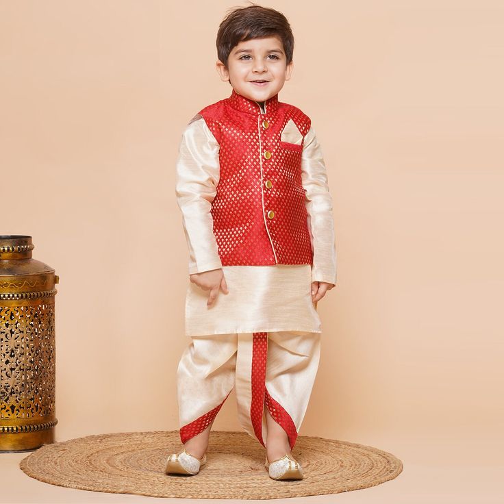 **Specifications : Please visit our brand store** https://www.etsy.com/in-en/shop/AJDezines?ref=seller-platform-mcnav Kurta : Solid Kurta made in raw silk fabric with front button opening. Dhoti : Solid Dhoti made in raw silk fabric, detailed design weaved on border with elasticated waist Waistcoat : Woven design Waistcoat made in Silk Blend fabric with front opening. 3 Pc Set : 1 Kurta, 1 Dhoti, 1 Waistcoat | |Style:- Dhoti Kurta Set For Boys With Waist Coat Care: Machine wash. Made in the auspicious colour palette and crafted in soft cotton, this dhoti-kurta set is a comfortable and versatile pick for the little desi dude's next traditional gathering. This kurta with dhoti pants has straight above knee kurta, and has a mandarin collar, long sleeves, straight hem, side slits. dhoti pants, Fitted Churidar For Puja, Art Silk Sets With Dabka For Celebration, Sherwani With Dori Work For Navratri Puja, Navratri Sherwani With Dori Work For Puja, Festive Bandhgala For Diwali With Traditional Drape, Fitted Art Silk Sherwani For Puja, Fitted Churidar With Dori Work For Puja, Dabka Art Silk Sherwani For Puja, Art Silk Sherwani For Diwali Puja