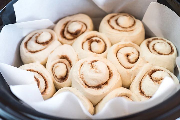 rolls are in the crock pot and ready to be cooked for dinner or dessert