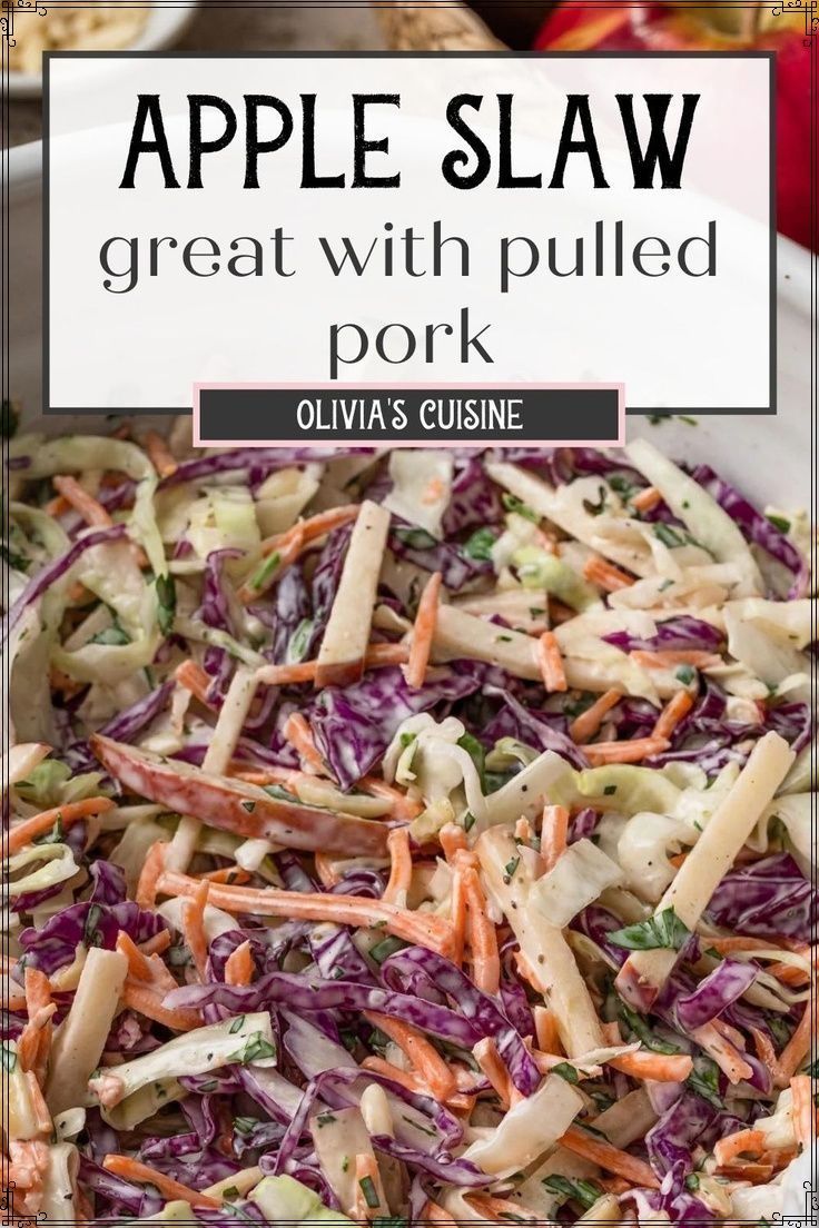 an apple slaw salad with shredded carrots and red cabbage