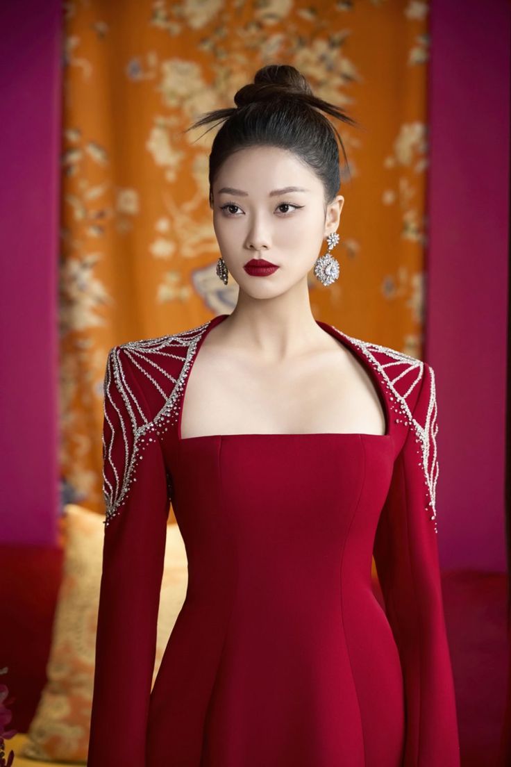 Indulge in luxury with our Ao Dai. Crafted with exquisite velvet and satin fabrics, this timeless piece features a flattering square shoulder design and a sleek sheath silhouette that will make you feel elegant and sophisticated. Elevate your style game with this exclusive and tasteful Ao Dai. Length: 150cm (Ao Dai), 110cm (Pants) Women Work Blouse, Red Lace Prom Dress, Satin Fabrics, Kente Dress, White Wedding Gowns, Mean Blvd, Fashion Top Outfits, Stylish Party Dresses, Arab Fashion