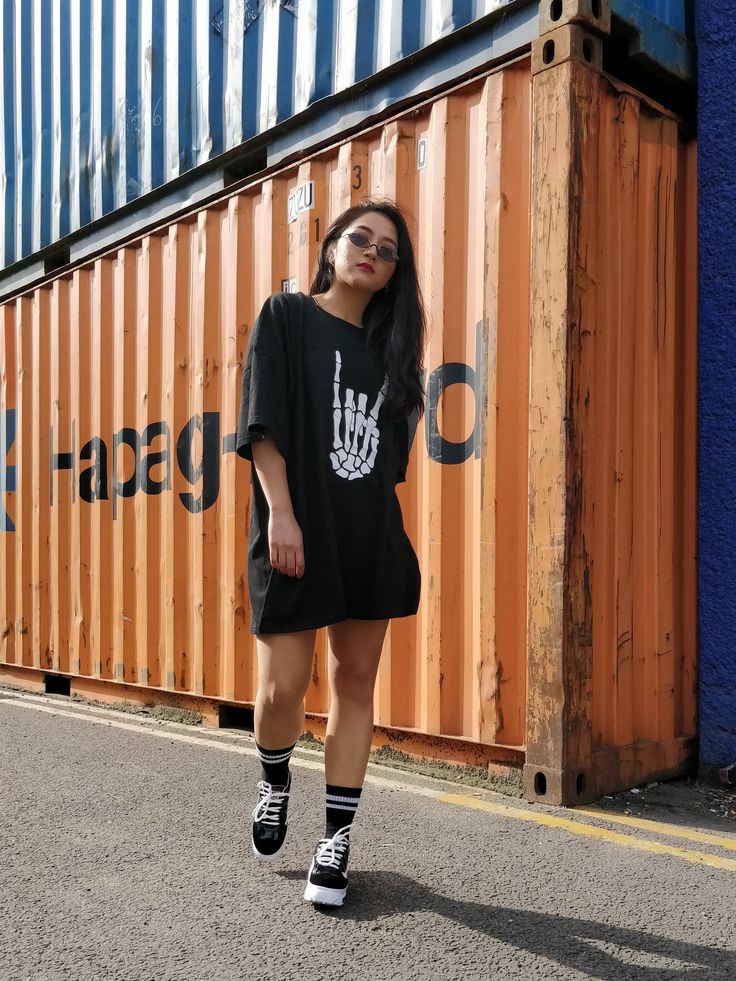 Halloween collection by Boisterous London, handmade here in the U.K. Each t-shirt is hand printed. Features contrast white halloween skeleton rock and roll logo, short sleeves, round ribbed neckline, comes in a unisex oversized loose fit.  SIZING AND CARE Model height 5ft 5 model is a size small. Model is wearing a size M. T-shirt comes oversized in a loose baggy fit. Please check exact chest measurements for desired size.  S chest 43/44 inches or 112cm Shoulder to hem 82cm,  M chest 45/47inches Rock Style Crew Neck T-shirt For Streetwear, Rock Style Short Sleeve T-shirt For Fall, Rocker Short Sleeve T-shirt For Streetwear, Rock Style Skull Print T-shirt, Relaxed Fit T-shirt For Halloween Concert, Relaxed Fit Rocker T-shirt For Streetwear, Rocker Style Short Sleeve T-shirt For Fall, Oversized Alternative T-shirt For Halloween, Rocker T-shirt With Skull Print For Streetwear