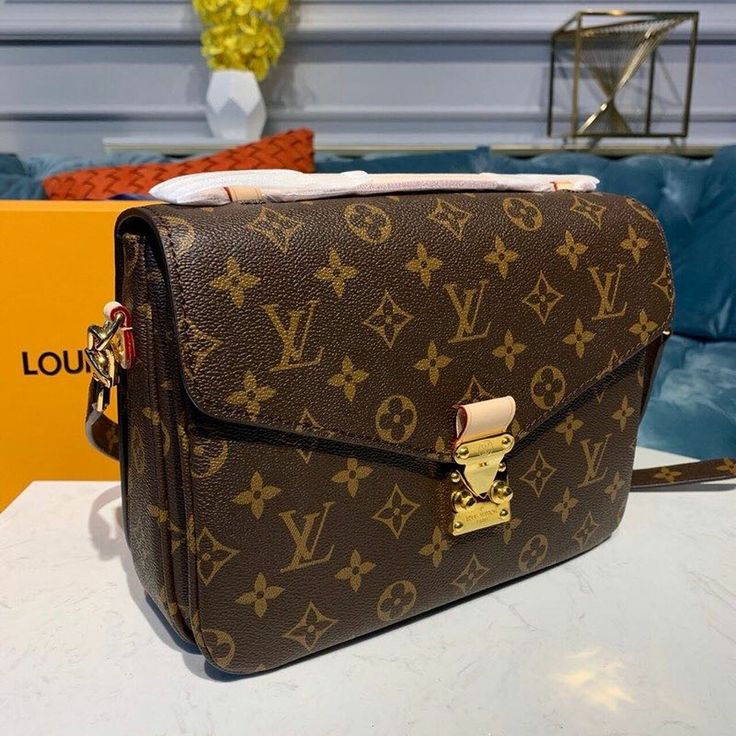 Description L.V Pochette Metis Bag Monogram Canvas For Women, Women’s Handbags, Shoulder And Crossbody Bags 9.8in/25cm LV M44875 Rep 1:1 Size: 25 x 19 x 7 cm / 9.8 x 7.5 x 2.8 inches (Length x Width x Height) With its on-trend satchel silhouette, the Pochette Métis bag has become an object of fashion desire. This compact, go-everywhere model in the House’s Monogram canvas features a distinctive S-lock closure with a polished gold-tone finish. Versatile and unexpectedly roomy, it is fitted with a Lv Pochette Metis, Louis Vuitton Pochette Metis, Louis Vuitton Shirt, Lv Pochette, Pochette Metis, Womens Handbags, S Monogram, Louis Vuitton Pochette, Chic Top