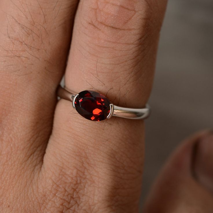 This is a gorgeous handmade creation. Its beauty is its simplicity & Elegance. The 6*8mm oval shape natural garnet (January birthstone) is crafted in solid sterling silver and with rhodium plated. All item is sent in a beautiful gift box You can realize more lovely stuff clicking the link https://www.etsy.com/shop/knightjewelry?refshopsection_shophome_leftnav Please leave the correct address and you phone number for delivering successfully. Oval Garnet Birthstone Ring, Oval Garnet Ruby Ring As Gift, Elegant Oval Garnet Birthstone Ring, Silver Oval Garnet Birthstone Ring, Oval Silver Garnet Birthstone Ring, Oval Garnet Birthstone Ring In Silver, Oval Garnet Birthstone Ring As Gift, Oval Garnet Birthstone Ring For Anniversary, Oval Garnet Rings As Gift