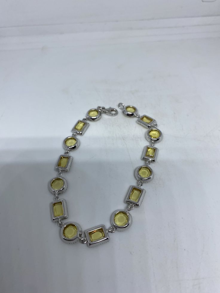 Vintage Cubic Zirconia Bracelet Clear Crystal Tennis 7.5 inches All jewelry is shipped free in the US in a nice gift box. Check out our over a THOUSAND great reviews Engraving is $4 per letter and is not always perfect depending on the piece. It can take a few days if the jeweler is busy. This is payable to Paypal Judithsltd@gmail.com Citrine Bracelet Jewelry Gift, Citrine Bracelet Jewelry For Gift, Yellow Bracelet Jewelry For Gift, Modern Round Tennis Bracelet As Gift, Yellow Crystal Bracelet As A Gift, Modern Yellow Jewelry For Gifts, Modern Yellow Jewelry For Gift, Modern Sterling Silver Cubic Zirconia Bracelet Gift, Elegant Yellow Bracelet As A Gift