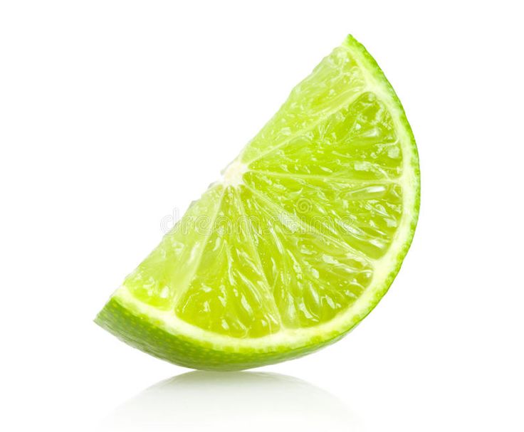 a lime slice cut in half on a white background