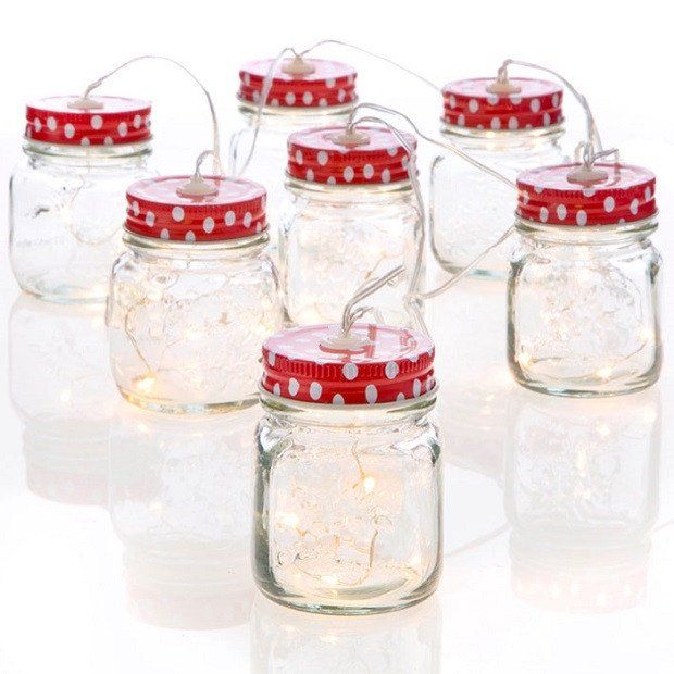 six glass jars with red and white polka dot lids