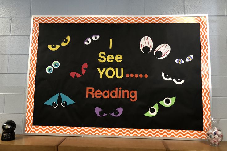 a bulletin board with an i see you reading sign