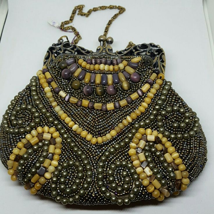 All Over Beaded Evening Bag Except For Small Area Shown Where 3-4 Beads Are Missing. Gold, Tan And Lavender Beads. New With Tags. Purple Beaded Shoulder Bag For Everyday Use, Beaded Purple Bag For Everyday Use, Purple Beaded Bags For Everyday Use, Purple Beaded Bag For Everyday Use, Purple Beaded Shoulder Bag For Party, Purple Beaded Party Shoulder Bag, Beaded Purple Party Bag, Elegant Beaded Purple Shoulder Bag, Purple Beaded Evening Bag