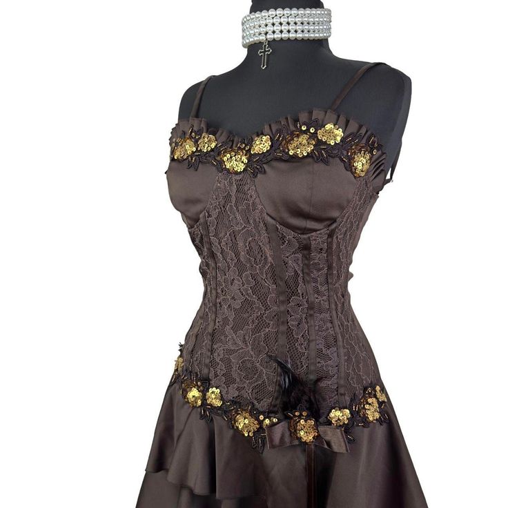 🪩 Vintage Gothic Beaded Sequin Embroidery Lace Waisted Brown Cocktail ' Party Dress    🪩 Size XS ' 6    🪩 Back Zip , Has  Stretch , No See Through , Padded Cup  🪩  Pit to pit 38 cm        Waist 34 cm        Hips 47 cm        Length 82 ' 103 cm  📏 Measurements were taken on flat ground 📏 🪩 Thank you for looking at our page, all dresses are vintage some are new with tags and some have been previously worn. Some dresses may gave some signs of wear due to the vintage condition however, dresse Fitted Overbust Fancy Dress, Fitted Lace Mini Dress For Costume Party, Lace Overbust Mini Dress For Party, Lace Mini Dress For Party, Party Dress With Lace Overbust, Embroidered Fitted Lace Mini Dress, Fitted Embroidered Dress For Party Season, Embellished Fitted Corset Dress For Party Season, Elegant Costume Dress With Sequins