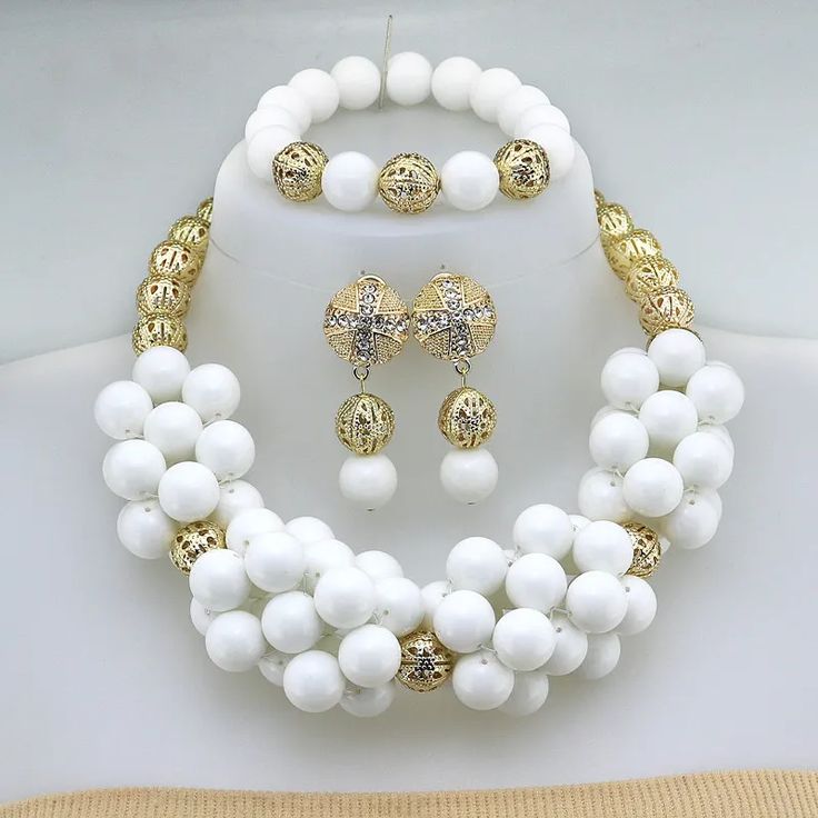 Enhance your bridal look with this classic Nigerian Wedding Bridal Jewelry. The African crystal beads jewelry set adds a touch of elegance and cultural significance to your wedding ensemble, creating a timeless and beautiful look. Crystal Beads Jewelry, African Wedding Jewelry, Glass Bead Jewelry, Nigerian Style, Crystal Bead Jewelry, Nigerian Weddings, Glass Beads Jewelry, Nigerian Wedding, Bridal Look