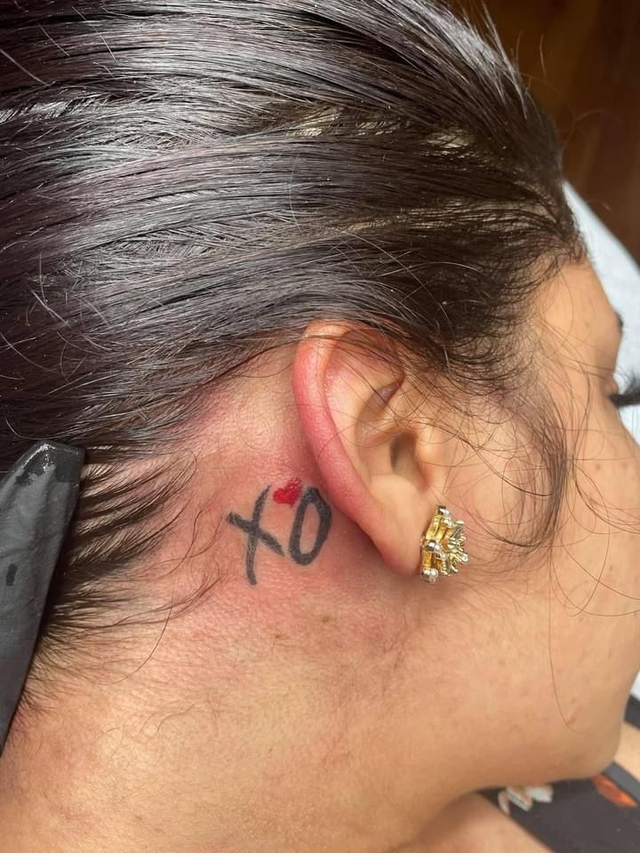 The Weeknd 
Abel Tesfaye
XOTWOD Xo Tattoo On Neck, Women Behind Ear Tattoo Ideas, Xo Behind Ear Tattoo, Xo Tattoo Behind Ear, Unique Behind Ear Tattoo, 111 Tattoo Behind Ear, Matching Ear Piercings, Behind The Ear, Weeknd Xo Tattoo