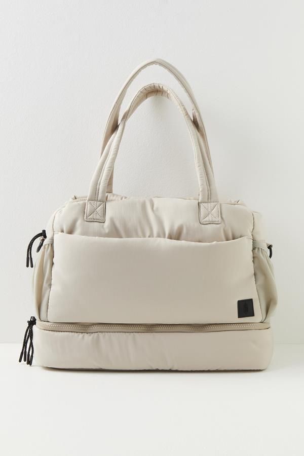 Your new go-to bag for all things active and beyond, this essential duffle from FP Movement is featured in our signature puffy ripstop fabrication with endless pockets for a true do-it-all bag.Height: 13 in Length: 16 in Depth: 6 in100% Polyester    Machine wash cold Free People Activewear, Workout Essentials, Essential Bag, Free People Movement, Fp Movement, Sneaker Heels, Personalized Accessories, Duffel Bag, Travel Bag