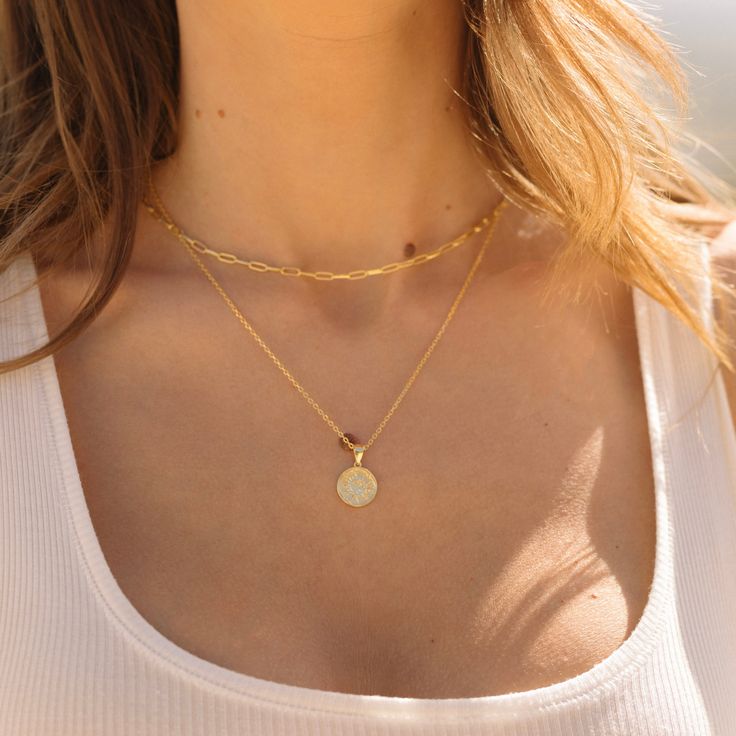 Radiate in our Sun necklace. - Waterproof, tarnish resistant & hypoallergenic- Made in gold vermeil: a thick 18k gold layer on sterling silver.- Adjustable chain 17 to 18 in.- Pendant size: 12.5 mm Everyday Gold Plated Medallion Jewelry, Gold Medallion Jewelry With Cable Chain, Layering Jewelry With Cable Chain, 14k Gold-filled Yellow Gold Coin Necklace, Gold Plated Medallion With Cable Chain, 14k Gold Medallion Cable Chain Jewelry, 14k Gold Medallion With Cable Chain, Gold Plated Figaro Chain Necklace For Layering, Dainty Gold Coin Necklace Tarnish Resistant