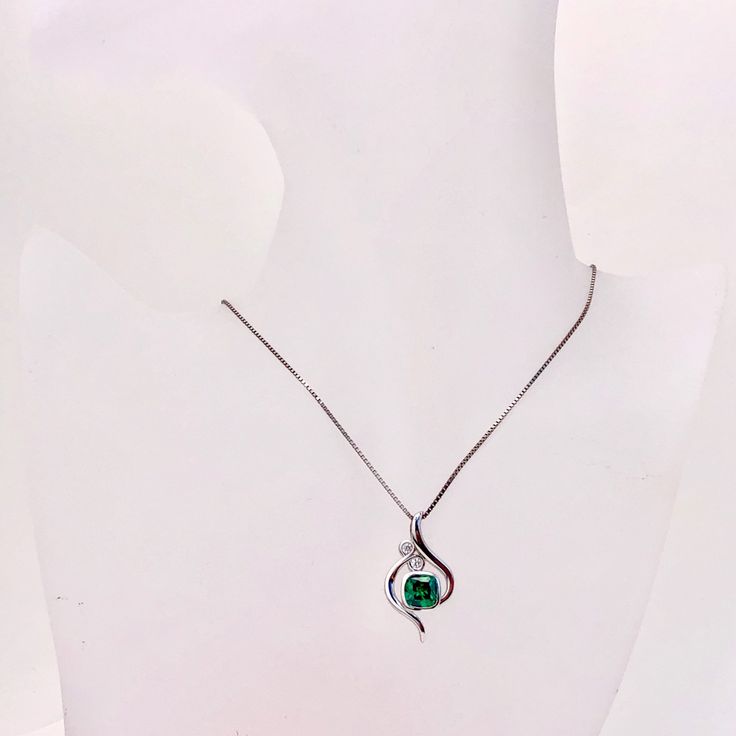 Green Emerald necklace - Sterling Silver Necklace - Emerald Pendant - Silver Pendant - May Birthstone Vitality Collection Sterling silver green emerald pendant, set with one small Topaz in a contemporary design. Emerald is the birthstone for May. Vitality designed by Chenny from our studio in Jersey CI. This contemporary gemstone range is to promote health, happiness and inspiration for people who loves our vibrant life. Available in 5 different gemstones, matching earrings and pendant available Fine Jewelry Green Diamond Necklace For Anniversary, Fine Jewelry Green Diamond Necklace, Green Diamond Necklace Fine Jewelry, Green Diamond Necklace For Formal Events, Formal Green Diamond Necklace For May Birthstone, Green Emerald Diamond Necklace For May Birthstone, Green Emerald Diamond Pendant Necklace, Fine Jewelry Green Necklace With Diamond Accents, Silver Emerald Diamond Necklace For Anniversary