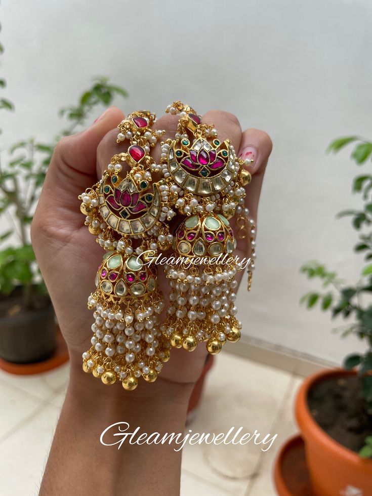 Lets play with mint. Added a twist to out pretty pachi kundan lotus earings with golden ball hangings giving a chandelier look supported with de attach able kundan ear chain Cheap Kundan Earrings As Gift, Luxury Fusion Style Chandbalis With Meenakari, Luxury Hand Set Jhumkas For Festivals, Luxury Green Jhumkas With Stone Work, Cheap Heavy Chandbali Jhumkas, Luxury Latkans Earrings For Festivals, Luxury Kundan Jhumkas With Gota Work, Luxury Fusion Chandelier Earrings With Latkans, Luxury Green Elegant Jhumkas