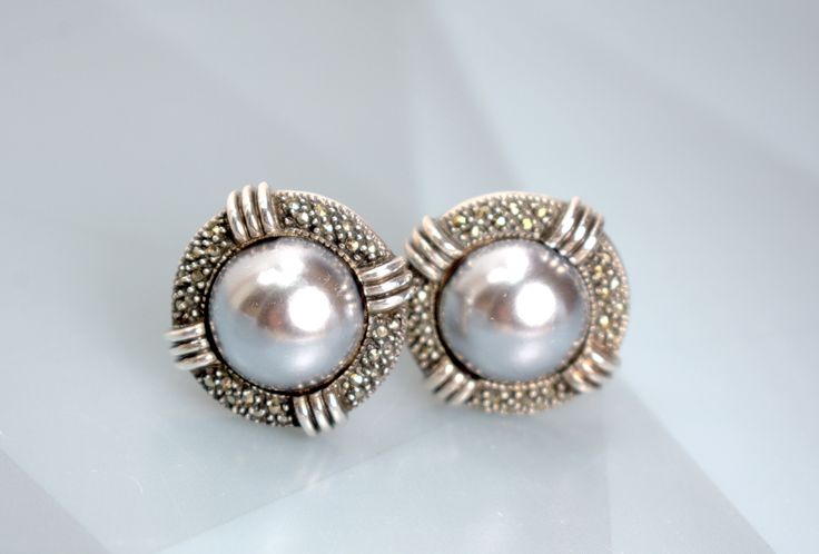 Classic Cabochon Clip-on Earrings For Anniversary, Vintage Silver Round Pearl Earrings, Silver Oval Clip-on Earrings For Formal Occasions, Silver Oval Clip-on Earrings For Formal Events, Elegant Oval Silver Clip-on Earrings, Elegant Silver Oval Clip-on Earrings, Silver Round Clip-on Earrings For Anniversary, Silver Clip-on Round Pearl Earrings, Vintage Sterling Silver Jewelry