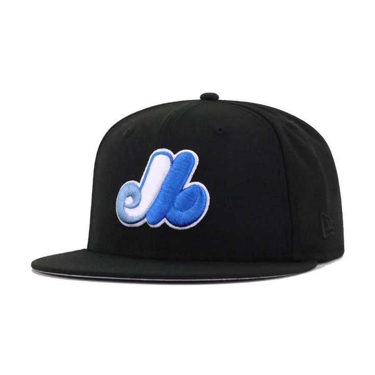 New Era Cap 59Fifty fitted hat for the Montreal Expos in black and blue colorway, featuring 1982 All Star Game side patch. We’ve taken our famous WAVE fitted and made a few revisions to make it even more fabulous. We’ve replaced Cerulean Blue with a softer Ultra Blue, which plays perfectly against the sharp Marine Blue embroidery. Our favorite part? The colors work perfectly in making the 1982 All Star Game side patch seem proportionate in size due to the two similar shades of blue playing so pe Blue Fitted Hat With Flat Brim For Streetwear, Blue Flat Brim Fitted Hat For Streetwear, Blue Snapback Fitted Hat For Streetwear, Blue Fitted Hat With Embroidered Logo For Streetwear, Blue Baseball Cap With Logo Patch And Flat Brim, Blue Sports Fitted Hat With Logo Patch, Blue Flat Brim Baseball Cap With Logo Patch, Blue Fitted Hat With Logo Patch For Sports, Hip Hop Blue Snapback Hat For Streetwear