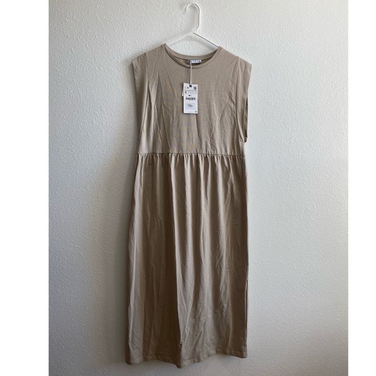 Size Small Nwt Casual Khaki Maxi Dress, Chic Sleeveless Khaki Midi Dress, Khaki Midi Dress For Spring Daywear, Zara Beige Cotton Dress, Beige Knee-length Sleeveless Dress For Day Out, Khaki Midi Summer Dress For Day Out, Summer Khaki Midi Dress For Day Out, Beige Sleeveless Knee-length Dress For Day Out, Sleeveless Beige Maxi Dress For Fall