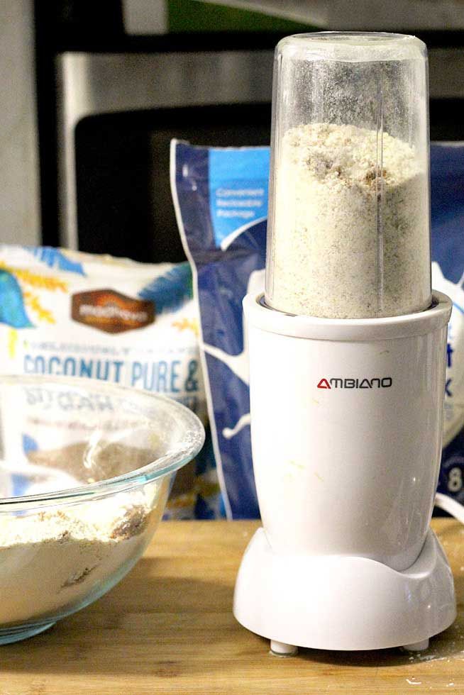 a food processor sitting on top of a wooden table