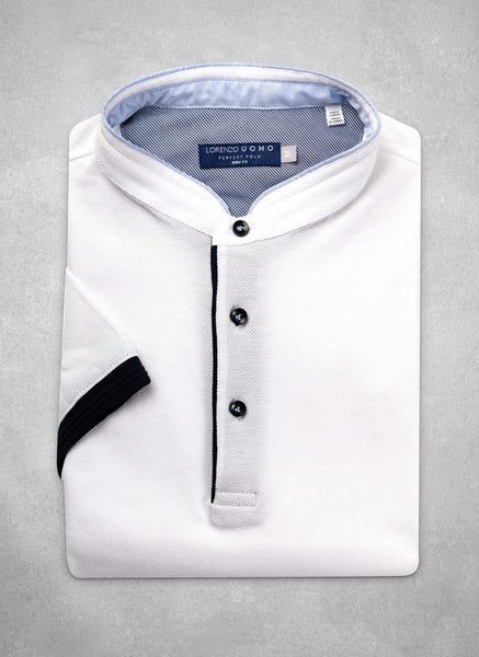 From our Perfect Polo Collection.  Inspired by the effortless style worn in Como, our Ultra-Luxurious Perfect Polo Shirt in Optic White with Banded Collar, meticulously crafted from the finest combed, pique cotton—the hand of which is super-soft and luxurious.  We have incorporated bespoke design elements such as elegant contrast fabric on the inside, complimenting the body of the polo, as well as Navy contrast buttons.  Simply the most perfect way to enjoy the warm weather. • Trim Fit • 100% Co White Polo Shirt With Polo Collar For Summer, White Polo Shirt For Summer, White Summer Polo Shirt, Casual White Stretch Polo Shirt, Fitted White Short Sleeve Polo Shirt, White Stretch Collared Top, Fitted White Tops With Placket, Fitted White Polo Shirt With Collar, Fitted White Polo Shirt