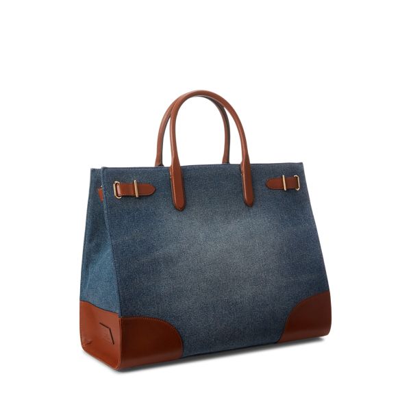 Rendered in vintage-inspired washed denim the large Devyn tote bag is designed with a spacious silhouette and a myriad of pockets offering ample storage for your essentials. It’s trimmed with supple full-grain leather—which is distinguished by its naturally smooth finish—for a luxurious touch. Luxury Denim Blue Bag For Daily Use, Luxury Denim Blue Shoulder Bag For Travel, Vintage Denim Shoulder Bag For Travel, Vintage Denim Blue Travel Bag, Denim Travel Satchel Bag, Travel Denim Shoulder Bag With Top Handle, Travel Denim Satchel Bag, Denim Blue Bag With Top Carry Handle, Luxury Denim Bags With Double Handle