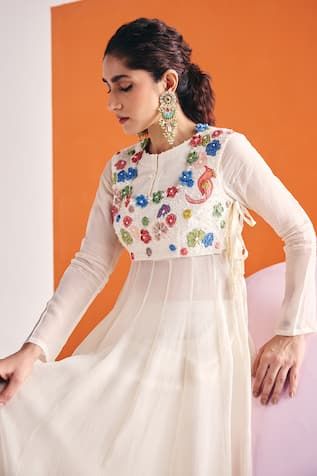 Ivory Anarkali featuring a crew neckline and full sleeves with floral patchwork and moti embellishments. Paired with a matching flared palazzo pant., Fit: Relaxed Ivory Anarkali, Palazzo Pants Pattern, Flare Palazzo Pants, Flared Palazzo, Floral Patches, Palazzo Pant, Floral Patchwork, Women Kurta, Pants Pattern