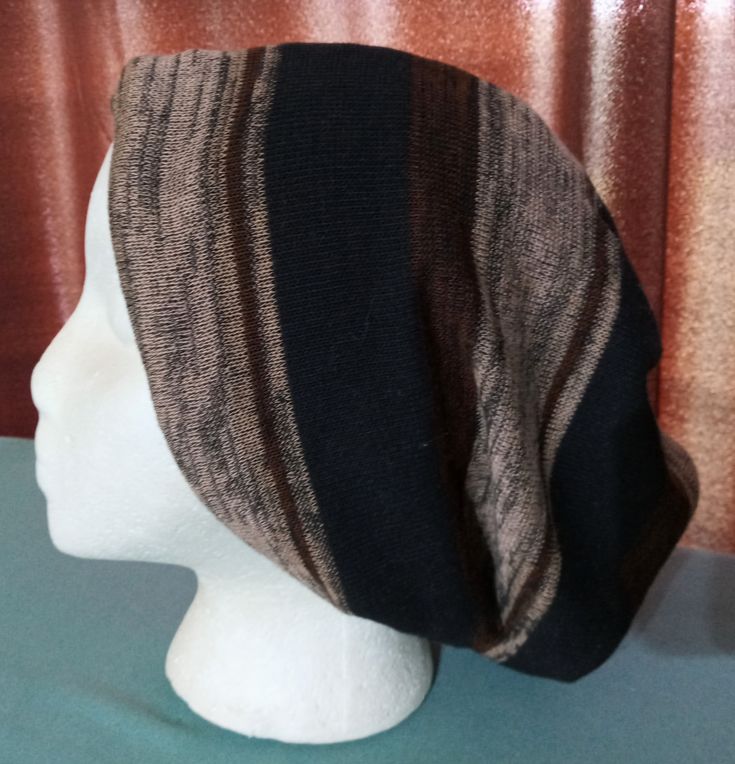 Made to order item, thanks. A cute, soft, easy on easy off twisted Beanie hat. Opening in the back. Ladies can put a ponytail through or wear closed. Suitable for men or women. Mix and match with a variety of tops. Made of 100% soft poly fabric. Can be yours today! Handmade Brown Casual Beanie, Casual Brown Acrylic Yarn Beanie, Handmade Adjustable Brown Beanie, Handmade Brown Beanie Hat, Brown Soft Knit Beanie, One Size Fits Most, Tribe Of Judah, Custom Banners, Skull Cap Beanie, Skull Cap