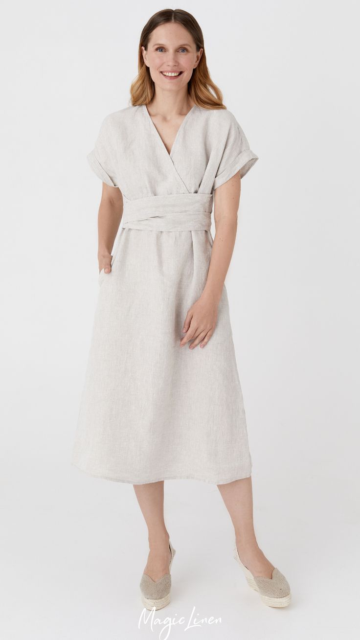 Elegant V-neck Linen Dress With Pockets, Linen Dress With Tie Waist And Surplice Neckline, Linen Midi Dress With Tie Waist, Elegant Short Sleeve Linen Dress With Belt, Linen Dress With Tie Waist And Short Sleeves, Beige Linen Dress With Tie Waist, Linen Wrap Dress With Belt, Elegant Belted Linen Maxi Dress, Belted V-neck Linen Midi Dress