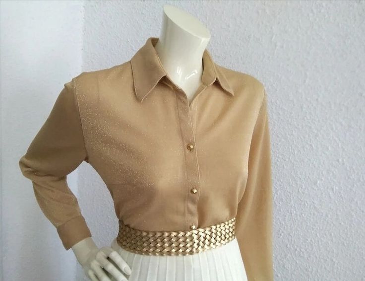 70s retro blouse, lurex blouse, golden glitter blouse, disco shirt, beige button up shirt, party evening blouse, stretchy jersey polyester blouse, C&A top, no label size, no label composition, probably fabric is jersey polyester. Measurements laying flat : shoulders :41cm (16inches) bust :50cm (19,5 inches) total lenght :46 cm (18 inches) sleeve lenght :58 cm (23 inches) Cheap Gold Long Sleeve Blouse, Fitted Gold Collared Top, Classic Gold Shirt For Party, Fitted Gold Top For Workwear, Fitted Gold Tops For Work, Retro Collared Party Tops, Elegant Gold Collared Top, Classic Gold Tops For Party, Chic Collared Gold Shirt