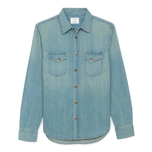 Distressed to perfection, this denim shirt is well-worn and wears well Classic Pre-washed Denim Tops, Classic Denim Tops Pre-washed, Classic Medium Wash Denim Top, Classic Washed Button-up Denim Top, Classic Distressed Cotton Denim Jacket, Classic Washed Denim Button-up Top, Classic Medium Wash Denim Shirt, Classic Washed Light Indigo Shirt, Classic Light Wash Denim Shirt