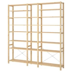 a wooden shelving unit with four shelves