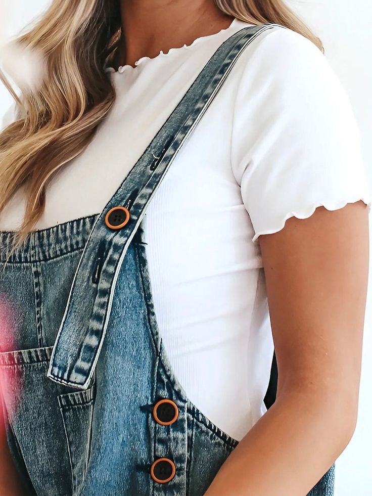 These Denim Overalls are crafted from washed denim for a stylish, weathered look. Featuring an oversized and loose fit with adjustable straps and distressed details, these overalls are designed to provide a comfortable, personalized fit. 81% Cotton, 14% Viscose, 5% Lyocell Washed faded finish Adjustable button straps Bib pocket Back pockets Loose slouchy fit Wide leg overalls Distressed detailing Machine wash cold inside out, tumble dry low The size shown in the size chart is the actual measurem Summer Medium Wash Overalls With Adjustable Straps, Medium Wash Overalls With Adjustable Straps For Summer, Summer Denim Overalls With Adjustable Straps, Summer Overalls With Adjustable Straps In Medium Wash, Summer Denim Blue Overalls With Adjustable Straps, Spring Casual Denim Jumpsuit With Adjustable Straps, Casual Denim Jumpsuit With Adjustable Straps For Spring, Trendy Distressed Light Wash Denim Jumpsuit, Trendy Dark Wash Denim Jumpsuit With Frayed Hem