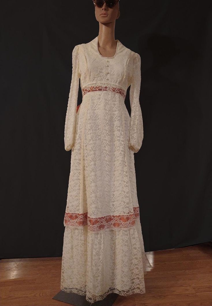 This is a very unique, one-of-a-kind vintage dress.  Not industrially produced, but made by an expert seamstress nevertheless. It's perfect and beautifully made, simple but with tasteful details; and best of all, it is Unique! Made in the 60s or 70s with "simply white" (warm cream tone), Chantilly style lace; fully lined with a good quality cream color lining material -mid-weight- and which is wrinkle and static resistant; sheer lace long sleeves mildly puffed; "A" shaped skirt; lace trim with t Homemade Wedding Dress, Maxi Lace Dress, 1970s Wedding Dress, Homemade Wedding, Hippie Dress, Dress Unique, Simply White, Dress Cream, Hippie Dresses