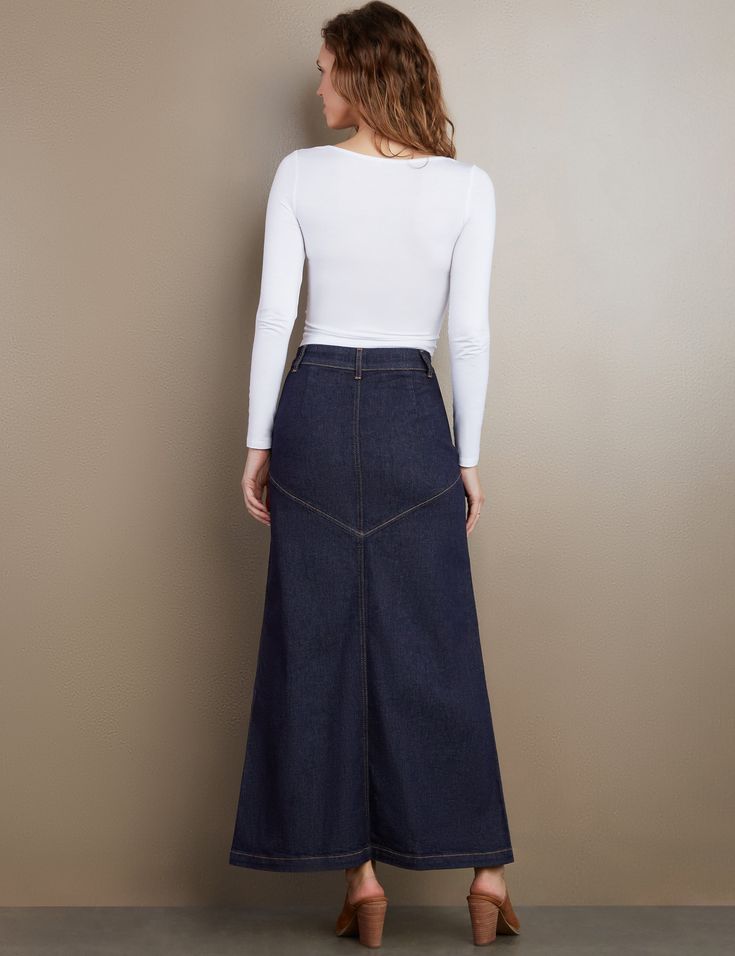 Details of old, made new. Beautiful waist/button detail, with pieced Premium denim construction, the Pieced Denim Maxi Skirt from Wash Lab is a must-own classic. The cover model is 5'9" wearing a size 26 Fabric: 95% Cotton 4% Polyester 1% Spandex Length: 39.25" from waist Dark Wash Denim Skirt With Pockets From Recycled Material, Dark Wash Recycled Denim Skirt With Pockets, Dark Wash Denim Skirt With Pockets In Recycled Denim, Fitted Recycled Denim Skirt With Pockets, Fitted Medium Wash Recycled Denim Skirt, Casual Fitted Denim Skirt In Recycled Material, Casual Fitted Denim Skirt In Recycled Denim, Fitted Casual Denim Skirt From Recycled Material, Casual Fitted Recycled Denim Skirt