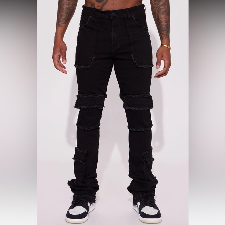 Stacked Skinny Flare Fit Cargo Pockets Zip Fly Button Closure 5 Pocket Body Frey Detail Black Stretch Cotton Cargo Jeans, Black Cotton Bottoms With Button Closure, Black Slim Fit Denim Bottoms, Fitted Black Cargo Jeans With Pockets, Black Fitted Cargo Jeans, Black Denim Pants With Button Closure, Black Cotton Pants With Button Closure, Black Ripped Punk Bottoms, Black Stretch Straight Leg Cargo Jeans