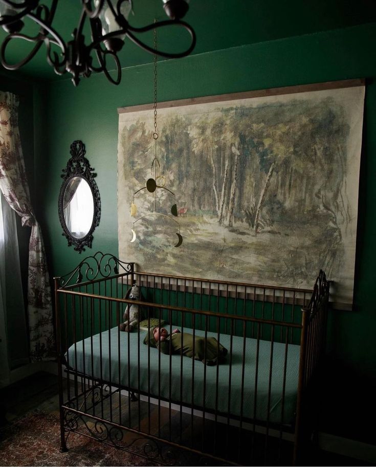 a dog laying on top of a bed in a room with green walls and curtains