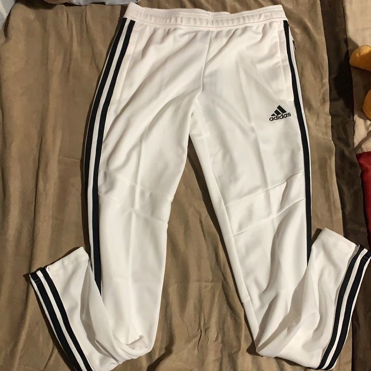 Brand New, Never Worn. White Adidas Sports Pants, Adidas White Sporty Sweatpants, Sporty White Bottoms With Side Stripes, White Stretch Bottoms With Three Stripes, White Cotton Pants With Side Stripes, Fitted White Bottoms With Side Stripes, Sporty Stretch White Pants, Sporty White Stretch Pants, Sporty White Fitted Pants