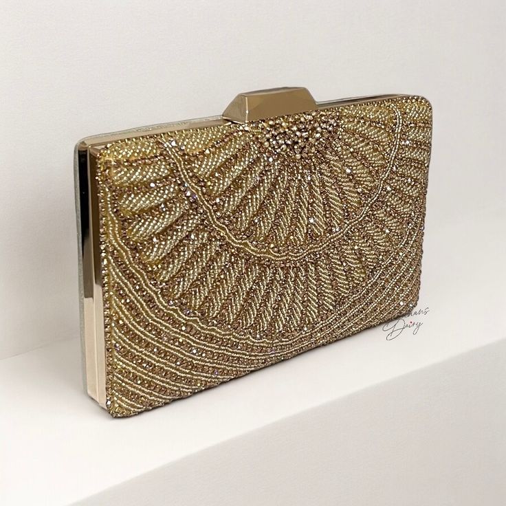 Introducing our exquisite Handmade Crystal Evening Clutch, a dazzling accessory fit for a bride's special day! 🌟 Handcrafted Elegance: Each clutch is meticulously handmade by skilled artisans, ensuring the utmost attention to detail and quality. ✨ Sparkling Crystals: Adorned with shimmering crystals that catch the light with every movement, this clutch adds a touch of glamour to your bridal ensemble. 👛 Perfect Size: With a roomy interior to hold your essentials - from keys, makeup to your phon Crystal Work, Bridal Elegance, Gold Clutch, Purse Gift, Beaded Wedding, Wristlet Clutch, Evening Clutch, Sparkling Crystal, Clutch Handbag