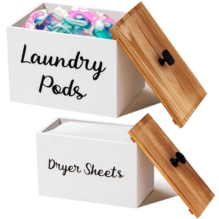 two white boxes with laundry pods in them