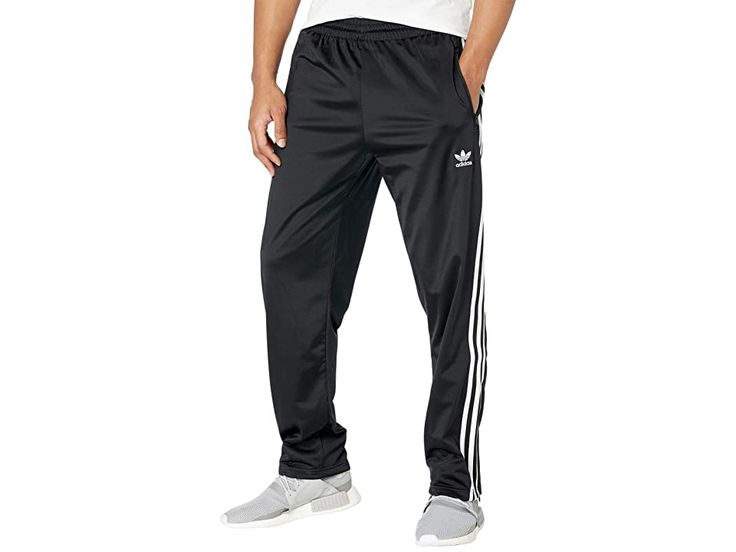 adidas Originals Firebird Track Pants - Men's Workout : Black 2 : The adidas Originals Firebird Track Pants have a '90s-inspired style and feature pintucks on the legs and signature subtle sheen that lends a throwback look. These pants have a regular fit that has a just right feel that isn't too tight or too loose. The elastic waistband with an adjustable drawcord so you get a secure feel every time. Zip close pockets in front let you keep the essentials safe when you're on-the-go. Sports a clas Track Pants Mens, Men's Workout, Adidas Outfit, 90s Inspired, Firebird, Pin Tucks, Stripes Design, Product Reviews, Mens Fitness