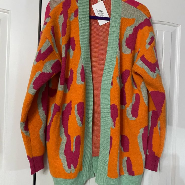 Multi Color Cardigan Duster (No Buttons), New And Never Worn. Measures Armpit To Armpit Laying Flat 23”, Shoulder To Hem 30”. Smoke Free Home Spring Layering Orange Sweater, Orange Long Sleeve Cardigan For Spring, Trendy Orange Sweater For Layering, Trendy Orange Winter Cardigan, Trendy Orange V-neck Sweater, Orange Long Sleeve One Size Cardigan, One Size Orange Long Sleeve Cardigan, Casual Orange Cardigan For Winter, Orange Spring Outerwear For Layering