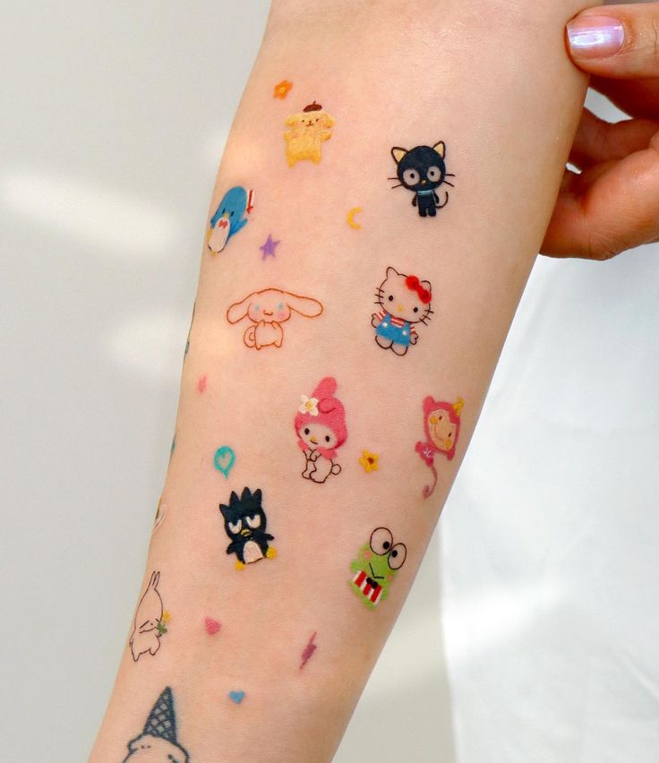 a person with many stickers on their arm