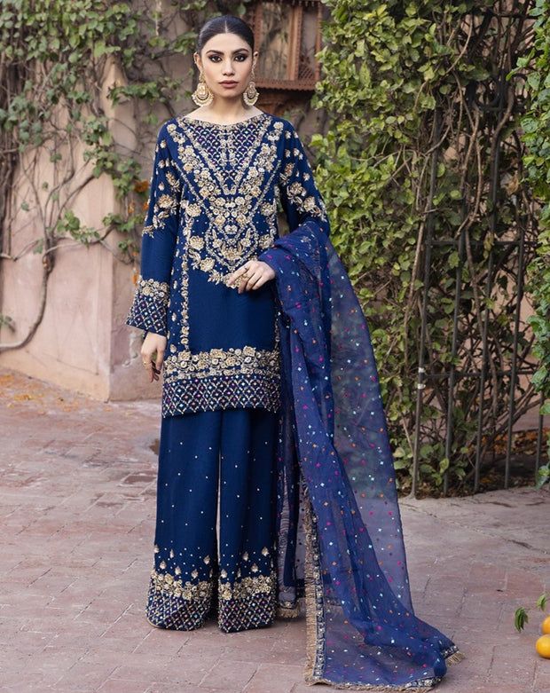 Festive Blue Sharara With Intricate Embroidery, Blue Organza Anarkali Set With Intricate Embroidery, Blue Dabka Salwar Kameez For Wedding, Designer Blue Intricately Embroidered Sharara, Blue Salwar Kameez With Dabka For Wedding, Blue Wedding Salwar Kameez With Dabka, Blue Lawn Suit With Dabka Work For Reception, Elegant Blue Lawn Suit With Mirror Work, Blue Organza Salwar Kameez For Reception