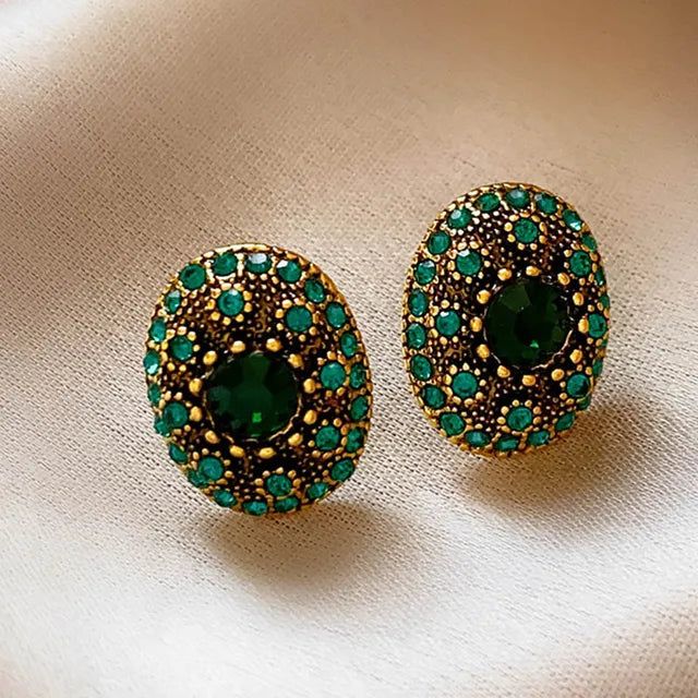 The perfect blend of vintage charm and modern elegance, they are crafted with quality metal and feature stunning glass detailing. Elevate any outfit with these unique and stylish earrings. - Color: Green- Material: Gemstone- Style: Earrings- Closure Type: Stud- Gender: Women Stylish Earrings, Stylish Earring, Green Material, Style Earrings, Earrings Color, Modern Elegance, Vintage Charms, Vintage Metal, Post Earrings