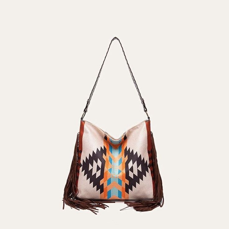 Discover Bohemian Elegance with Our Canvas Shoulder Bag Introducing a stunning blend of casual charm and bohemian flair, our large canvas shoulder bag is designed to elevate your everyday style. Crafted from high-quality cotton and linen, this bag features a vibrant, geometric pattern complemented by playful tassels, encapsulating a vintage Bohemia style. Perfect for a variety of occasions, from a casual day out to a stylish evening event, this bag is as versatile as it is fashionable. Key Featu Colorful Knitting, Bohemia Style, Shipping Tags, Bag Stand, Canvas Shoulder Bag, Tag A Friend, Bohemian Chic, Large Canvas, Accessories Unique